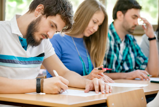 A college student taking an exam
